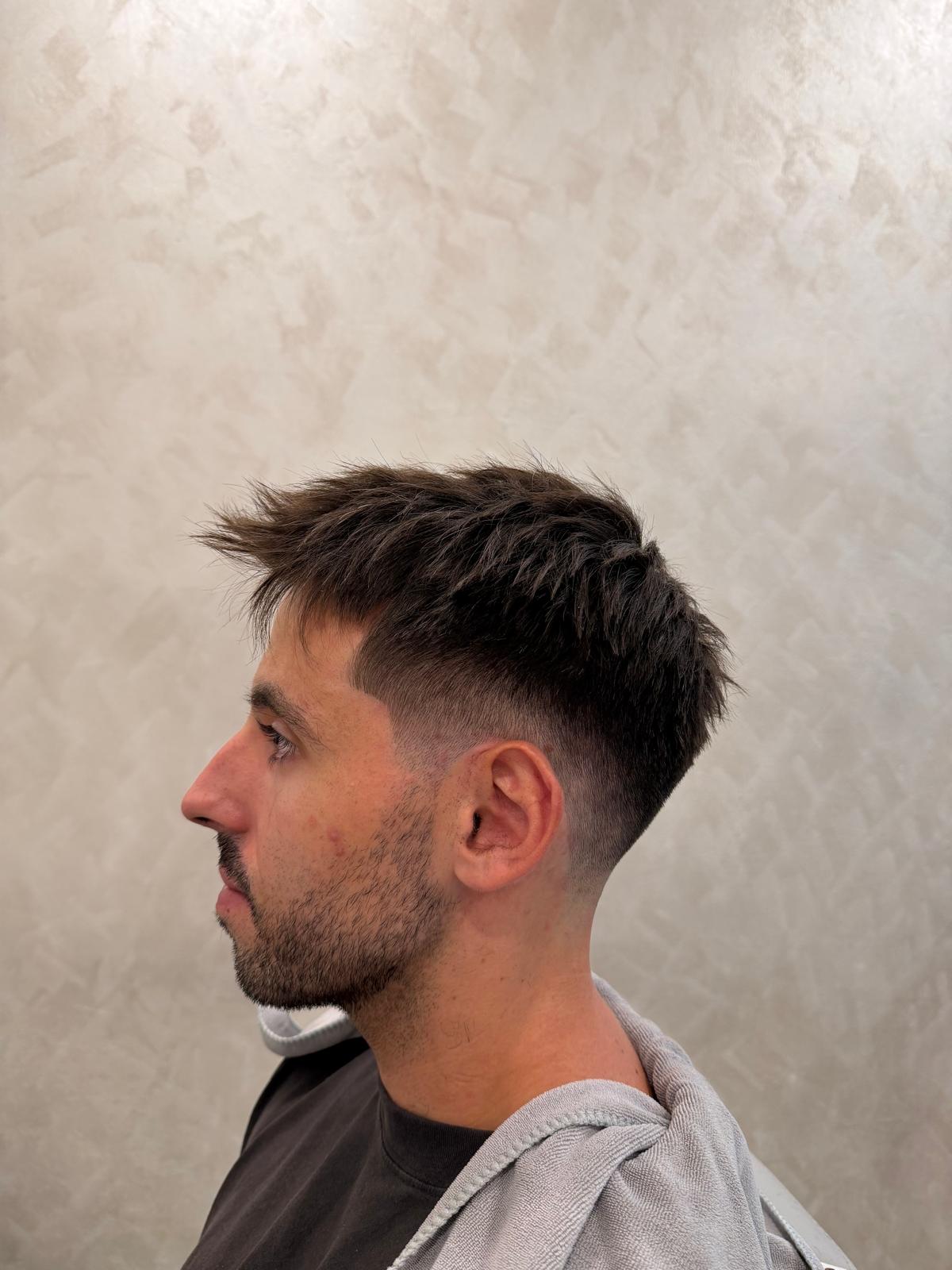 Textured short haircut viewed from the side